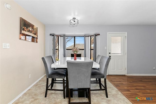 dining space featuring light hardwood / wood-style flooring