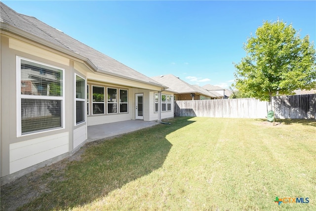 view of yard with a patio area