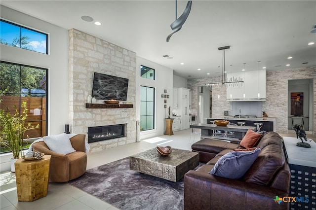 tiled living room featuring a fireplace