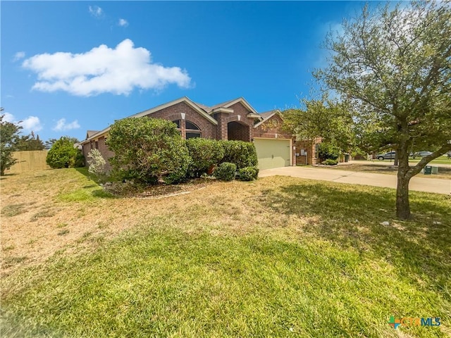 10012 Orion Dr, Temple, TX 76502 - view of front facade featuring concrete driveway, brick siding, and an attached garage