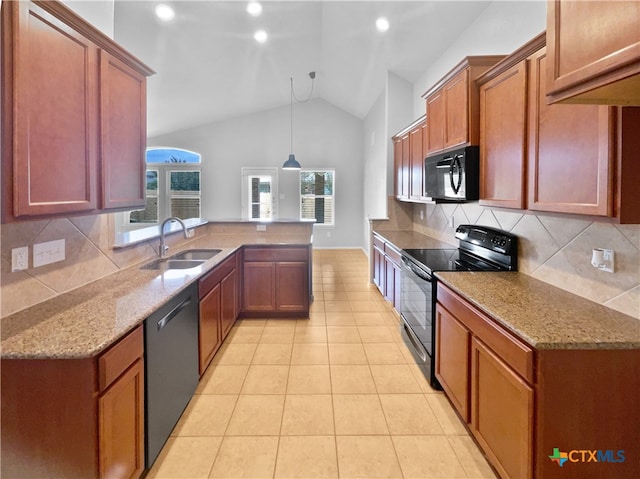 kitchen featuring sink, black appliances, backsplash, decorative light fixtures, and vaulted ceiling