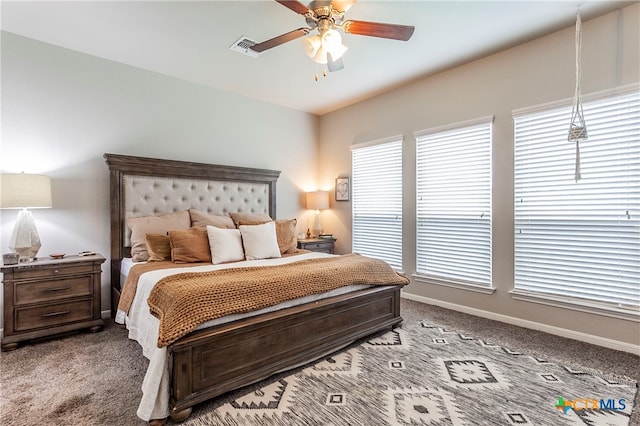 bedroom with light carpet and ceiling fan