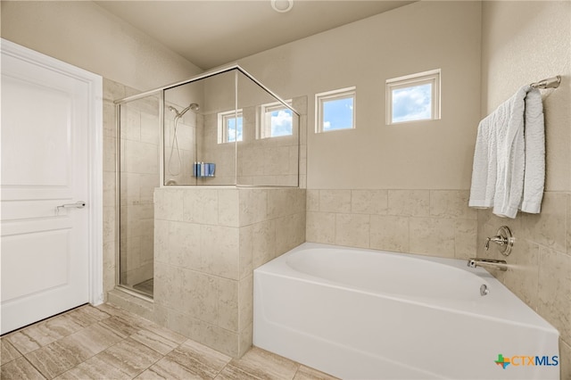 bathroom with independent shower and bath