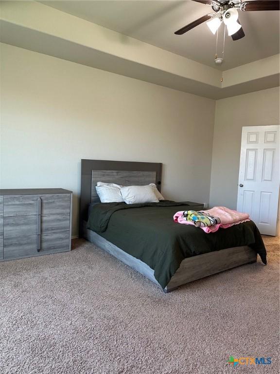 215 Danielle Dr, Killeen, TX 76542 - carpeted bedroom with a ceiling fan