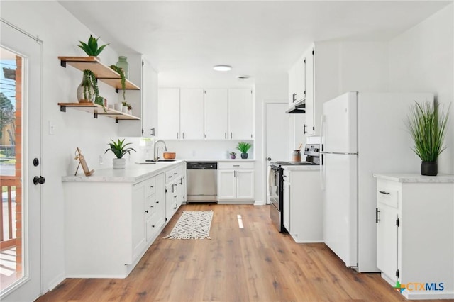 kitchen with open shelves, freestanding refrigerator, range with electric cooktop, dishwasher, and under cabinet range hood