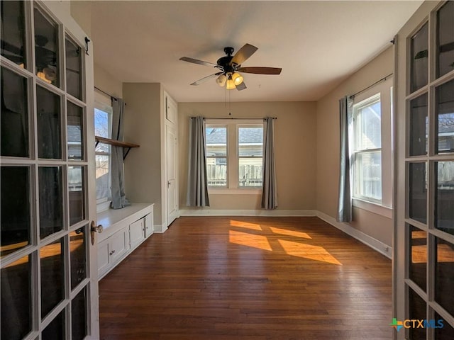 207 W 5th St, Lampasas, TX 76550 - unfurnished living room with dark wood-style floors and ceiling fan