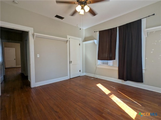 207 W 5th St, Lampasas, TX 76550 - unfurnished bedroom with wood finished floors and ceiling fan
