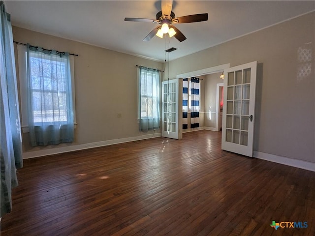 207 W 5th St, Lampasas, TX 76550 - empty room featuring french doors, dark wood-type flooring, and ceiling fan