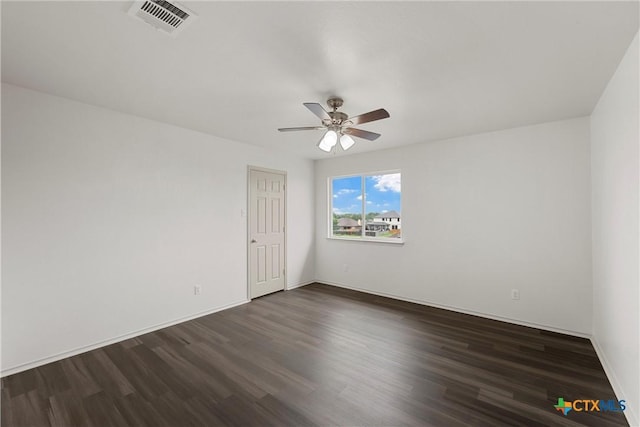 5501 Southern Belle Dr, Killeen, TX 76542 - spare room with a ceiling fan, dark wood finished floors, and baseboards