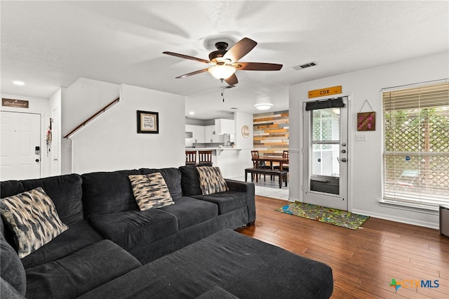 913 Risen Star Ln, Copperas Cove, TX 76522 - living room featuring a ceiling fan, wood-type flooring, and baseboards