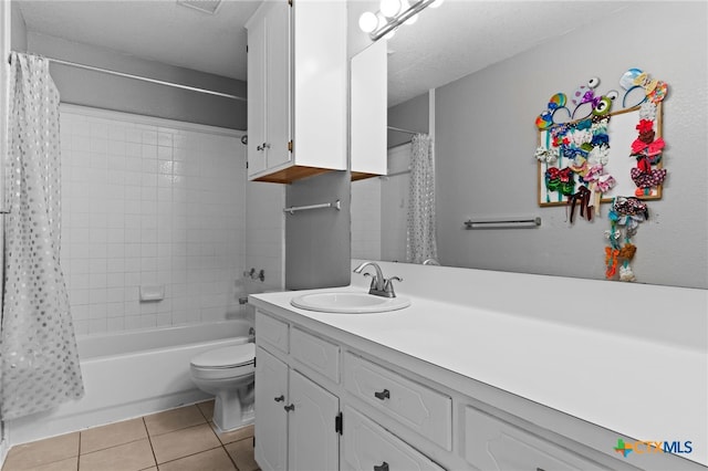 913 Risen Star Ln, Copperas Cove, TX 76522 - bathroom featuring tile patterned flooring, vanity, toilet, and shower / tub combo