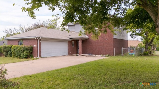 913 Risen Star Ln, Copperas Cove, TX 76522 - view of front facade featuring brick siding, an attached garage, and concrete driveway