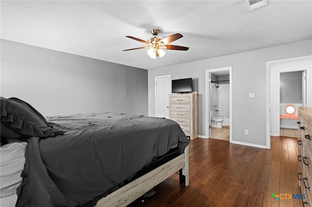 913 Risen Star Ln, Copperas Cove, TX 76522 - bedroom featuring dark wood-type flooring, baseboards, ensuite bathroom, and a ceiling fan