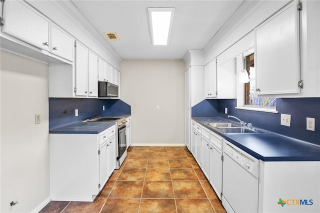 kitchen with tasteful backsplash, stainless steel electric range oven, white dishwasher, and white cabinets