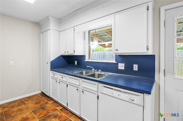 kitchen with sink, white cabinets, white dishwasher, and decorative backsplash