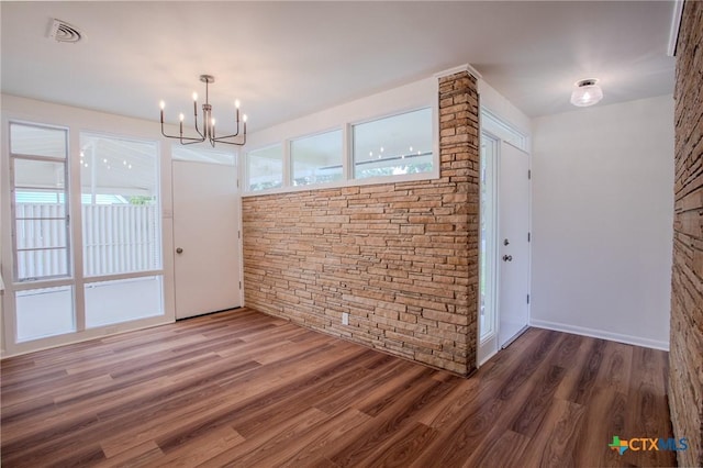 2906 Arroyo Dr, Victoria, TX 77901 - unfurnished dining area featuring a chandelier and wood finished floors