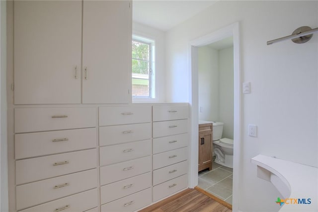2906 Arroyo Dr, Victoria, TX 77901 - walk in closet with light wood-style flooring