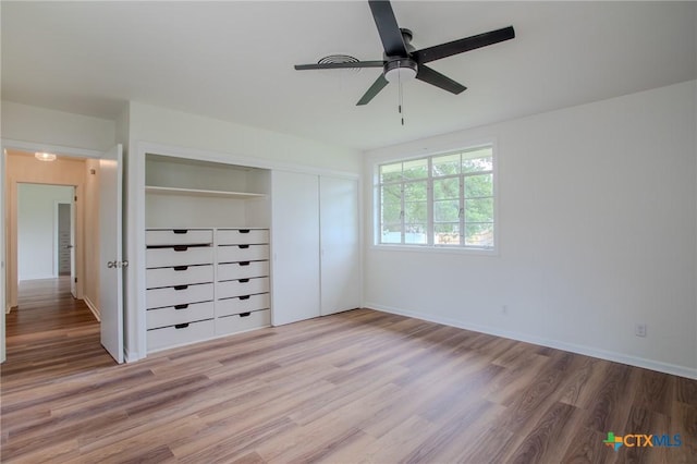 2906 Arroyo Dr, Victoria, TX 77901 - unfurnished bedroom featuring light wood finished floors, a closet, and ceiling fan