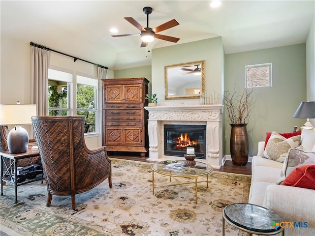 121 Wild Honeysuckle Way, San Marcos, TX 78666 - living room with a ceiling fan, wood finished floors, a fireplace, and recessed lighting