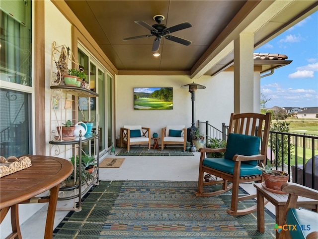 121 Wild Honeysuckle Way, San Marcos, TX 78666 - covered porch featuring a ceiling fan