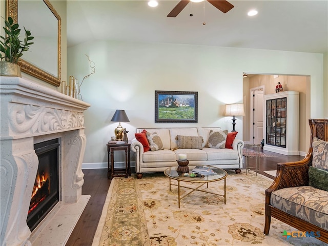 121 Wild Honeysuckle Way, San Marcos, TX 78666 - living room featuring a high end fireplace, a ceiling fan, baseboards, recessed lighting, and wood finished floors