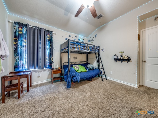 carpeted bedroom featuring ceiling fan and lofted ceiling