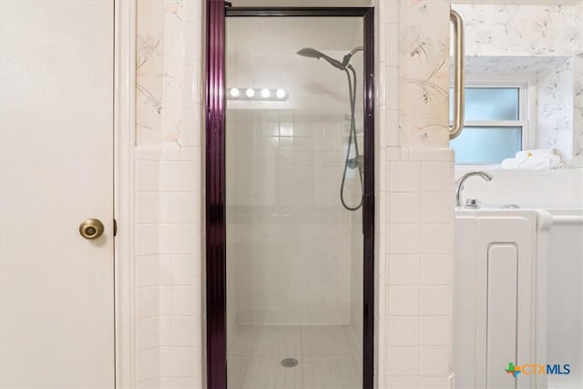 3927 Amanda Dr, Salado, TX 76571 - bathroom featuring a stall shower and wallpapered walls