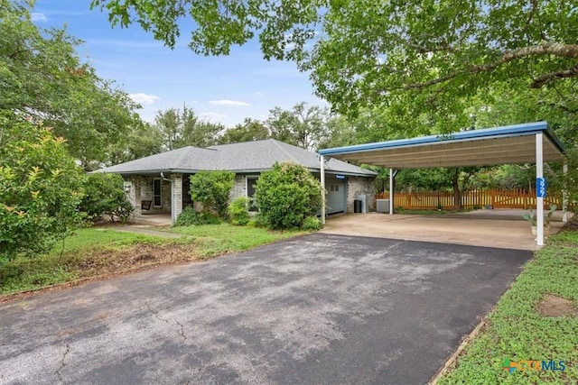 3927 Amanda Dr, Salado, TX 76571 - single story home featuring asphalt driveway and a carport