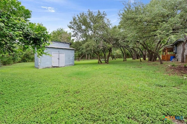 3927 Amanda Dr, Salado, TX 76571 - view of green lawn featuring a storage shed