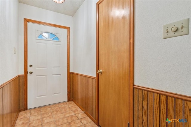 3927 Amanda Dr, Salado, TX 76571 - entryway featuring wainscoting and wooden walls