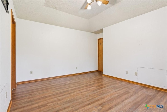 3927 Amanda Dr, Salado, TX 76571 - unfurnished room featuring wood finished floors, a ceiling fan, and a textured ceiling