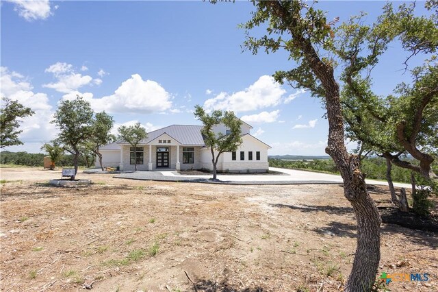 1193 Country Pike, Canyon Lake, TX 78133 - modern farmhouse style home featuring a metal roof