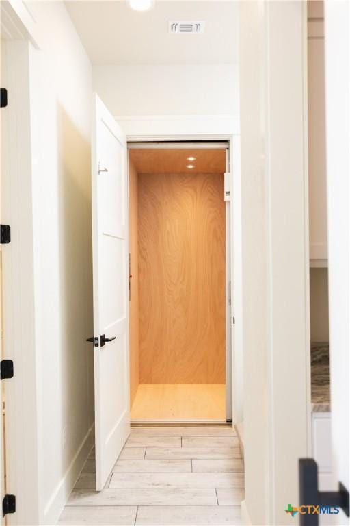 1193 Country Pike, Canyon Lake, TX 78133 - corridor with light wood-style floors and baseboards