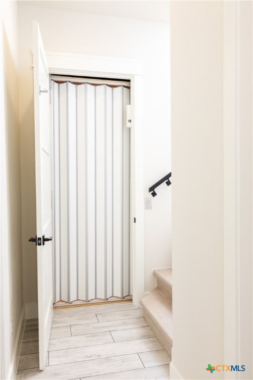 bathroom featuring wood-type flooring