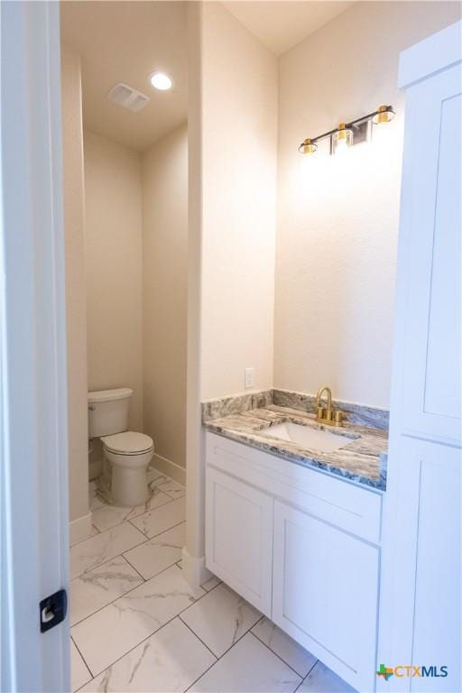 1193 Country Pike, Canyon Lake, TX 78133 - bathroom featuring vanity and marble look tile flooring