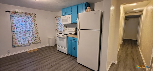 302 E Dallas Ave, Seadrift, TX 77983 - kitchen featuring blue cabinets, white appliances, dark wood-style floors, and light countertops