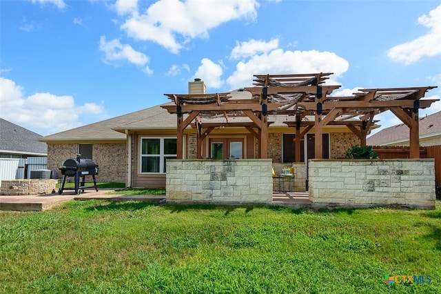 1127 Chaucer Ln, Harker Heights, TX 76548 - rear view of property with a pergola, a patio area, a chimney, and brick siding