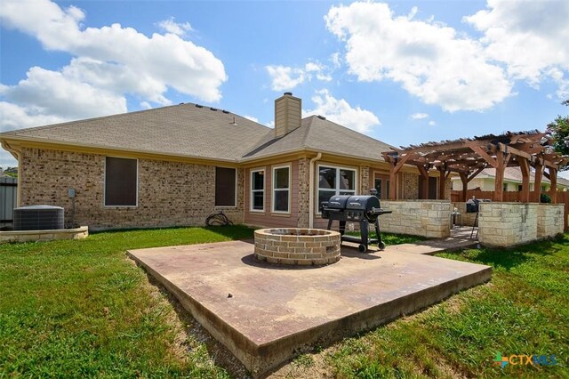 1127 Chaucer Ln, Harker Heights, TX 76548 - rear view of house with a fire pit, a patio, a pergola, a yard, and a chimney