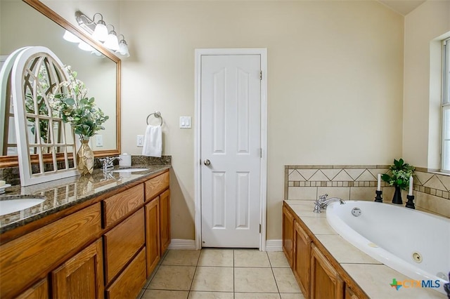 1127 Chaucer Ln, Harker Heights, TX 76548 - full bathroom featuring double vanity, a jetted tub, and tile patterned floors