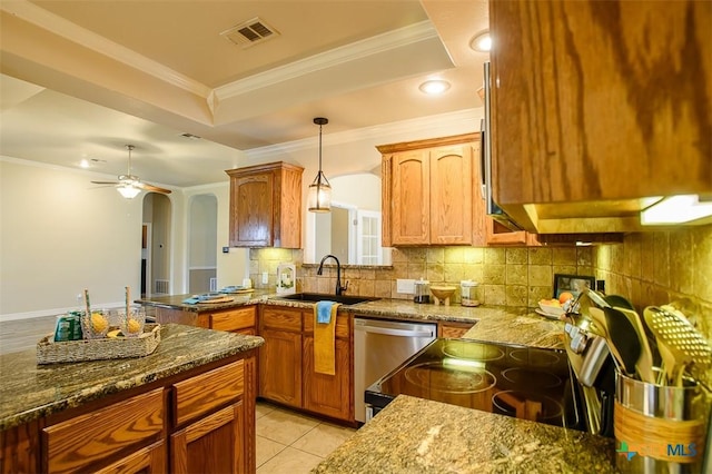1127 Chaucer Ln, Harker Heights, TX 76548 - kitchen featuring stainless steel appliances, arched walkways, backsplash, ornamental molding, and dark stone counters