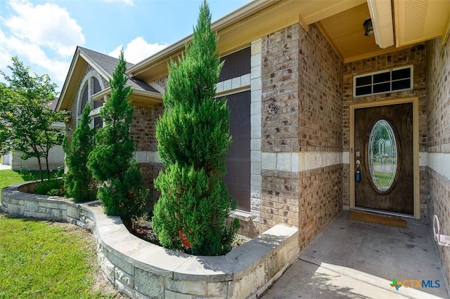 1127 Chaucer Ln, Harker Heights, TX 76548 - view of exterior entry with brick siding