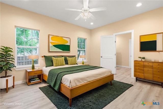 1700 Proctor Ave, Waco, TX 76708 - bedroom with light wood-style flooring, multiple windows, recessed lighting, and ceiling fan