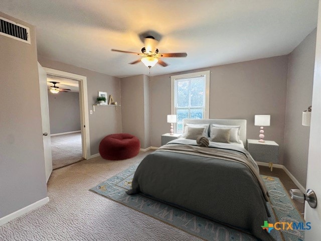 carpeted bedroom with ceiling fan