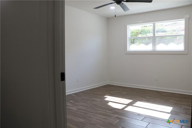 2704 Loma Vista Ave, Victoria, TX 77901 - spare room with dark wood-type flooring, a ceiling fan, and recessed lighting