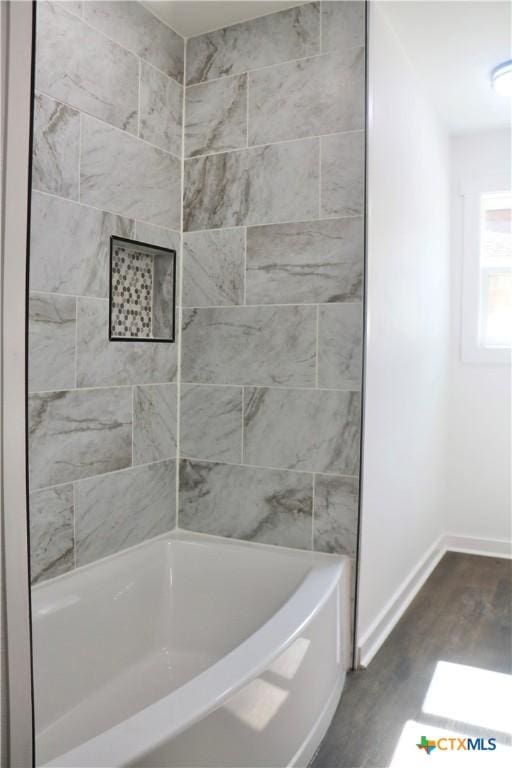 2704 Loma Vista Ave, Victoria, TX 77901 - full bathroom with wood finished floors and shower / washtub combination