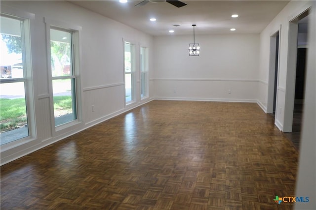 2704 Loma Vista Ave, Victoria, TX 77901 - spare room featuring a ceiling fan, a chandelier, wainscoting, and recessed lighting