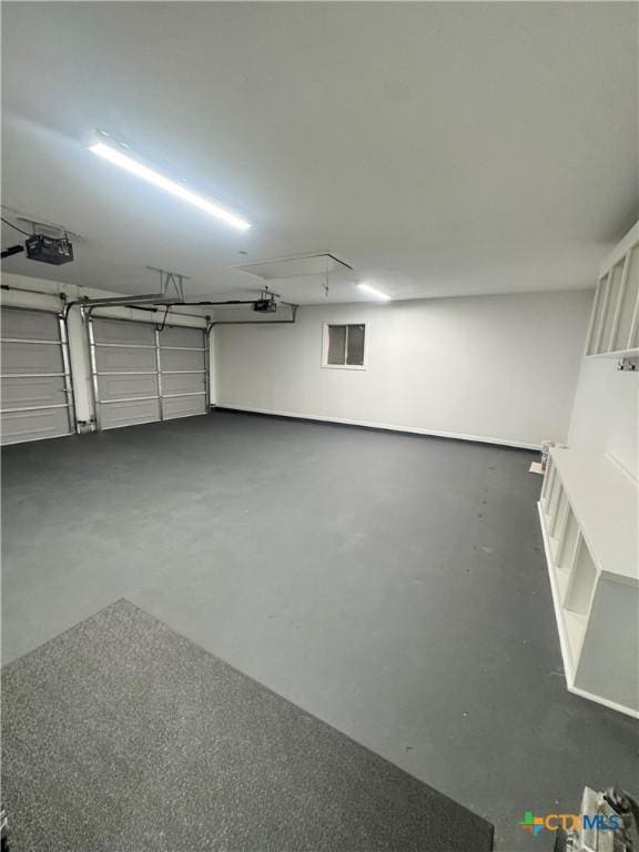 2704 Loma Vista Ave, Victoria, TX 77901 - garage featuring a garage door opener