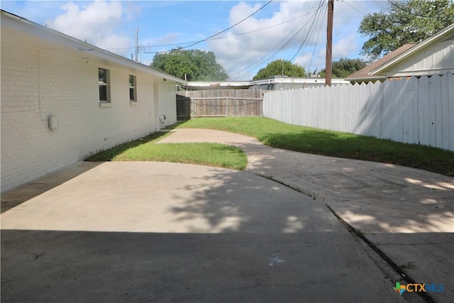 2704 Loma Vista Ave, Victoria, TX 77901 - view of yard featuring a patio