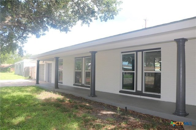 2704 Loma Vista Ave, Victoria, TX 77901 - view of home's exterior with a lawn