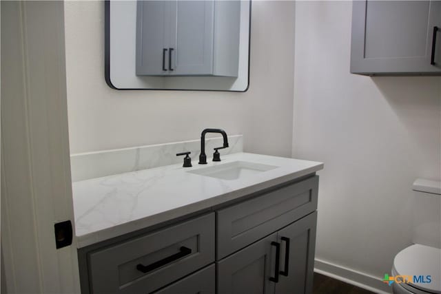 2704 Loma Vista Ave, Victoria, TX 77901 - bathroom with vanity and wood finished floors